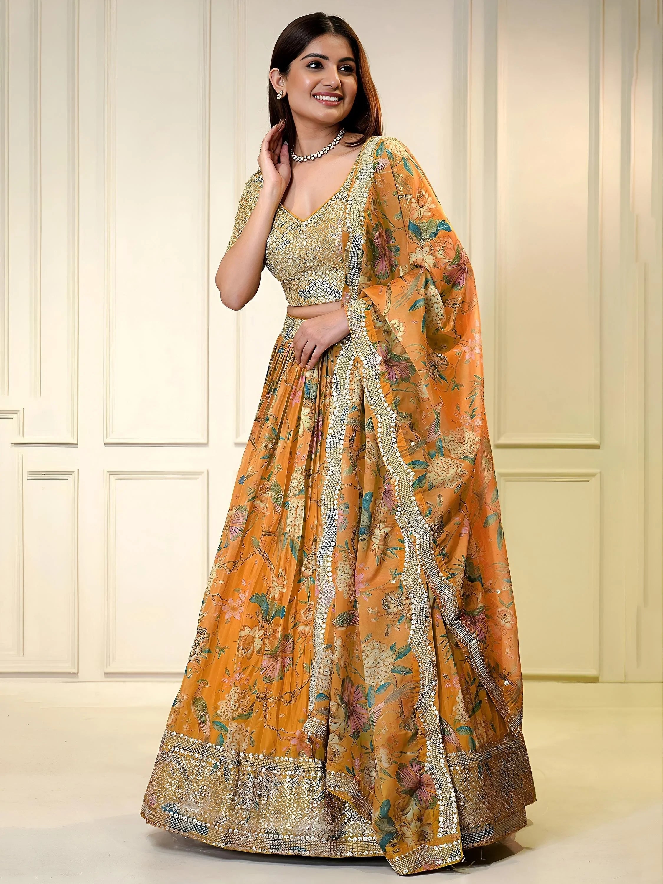 Sequins embellished organza lehenga choli for wedding and party occasions