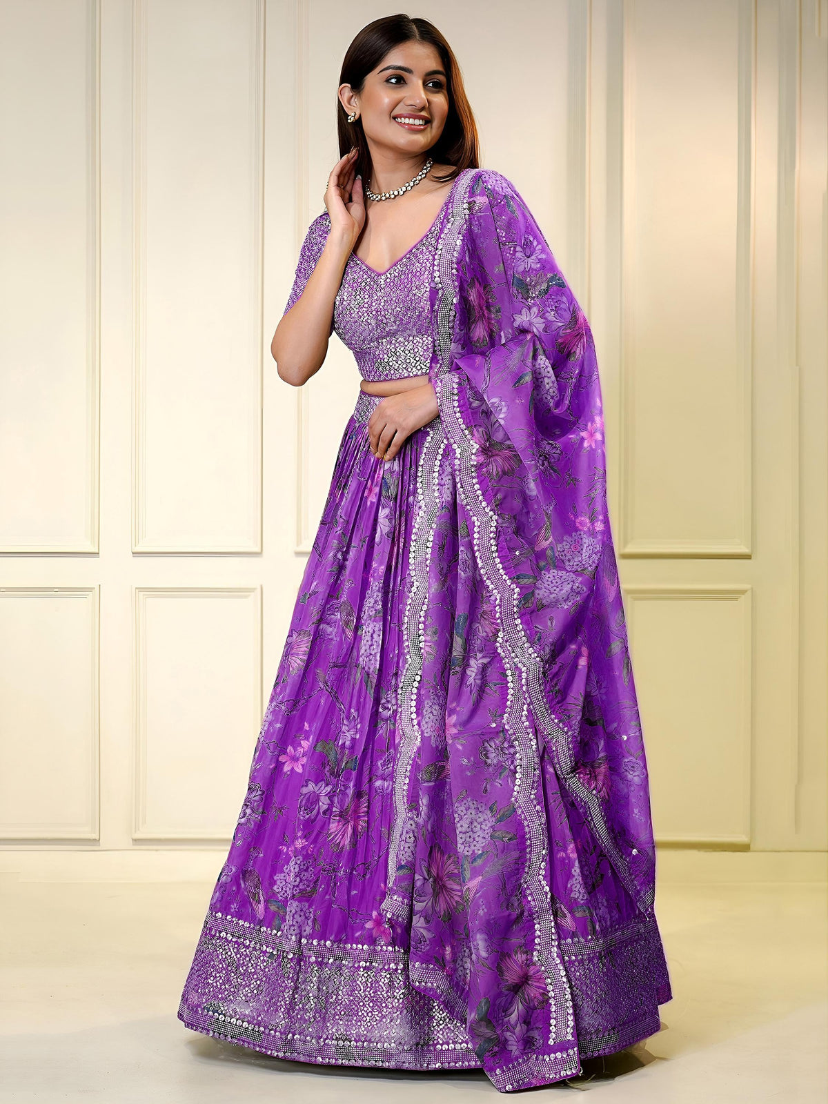 Sequins embellished organza lehenga choli for wedding and party occasions