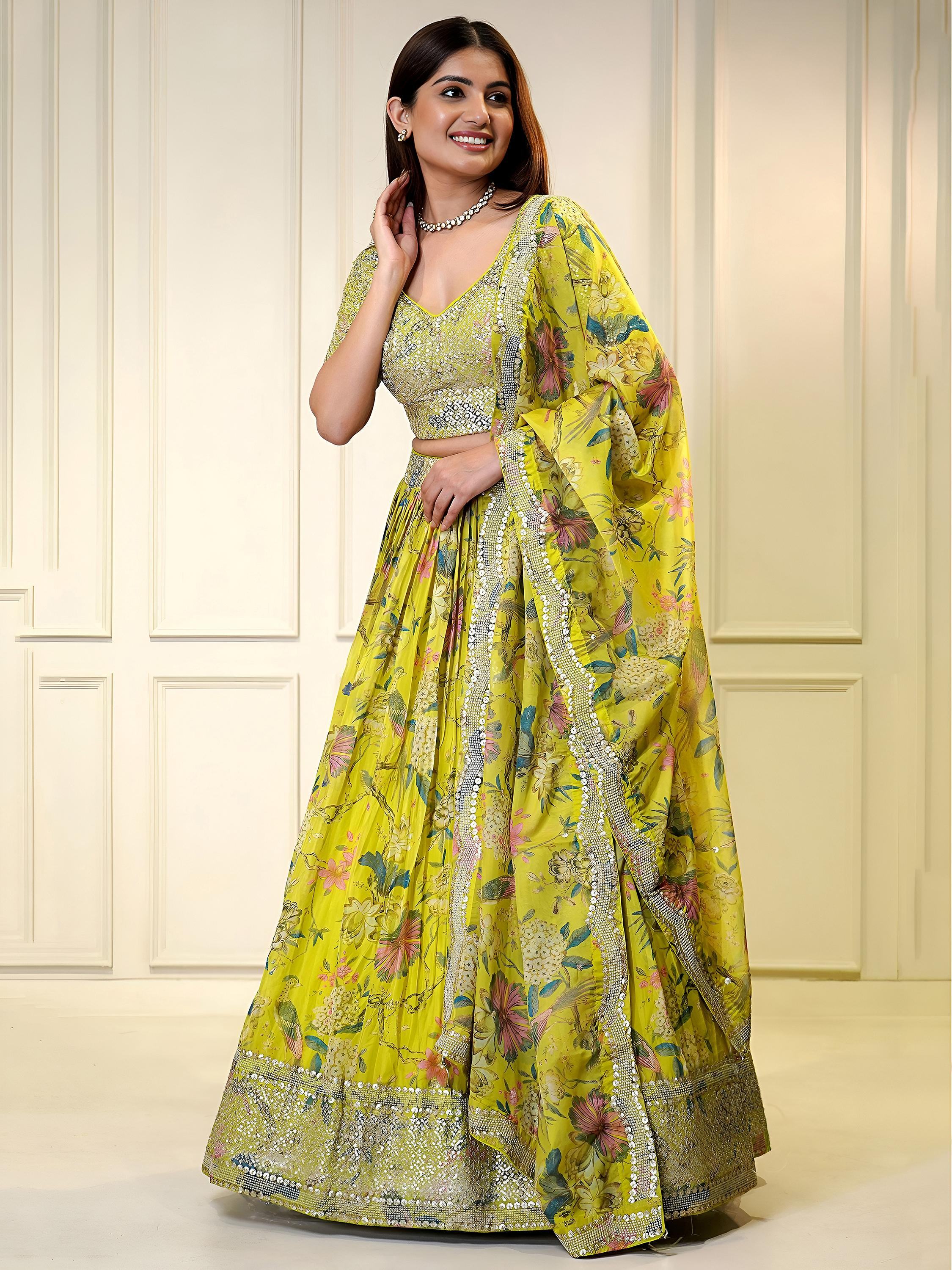 Sequins embellished organza lehenga choli for wedding and party occasions
