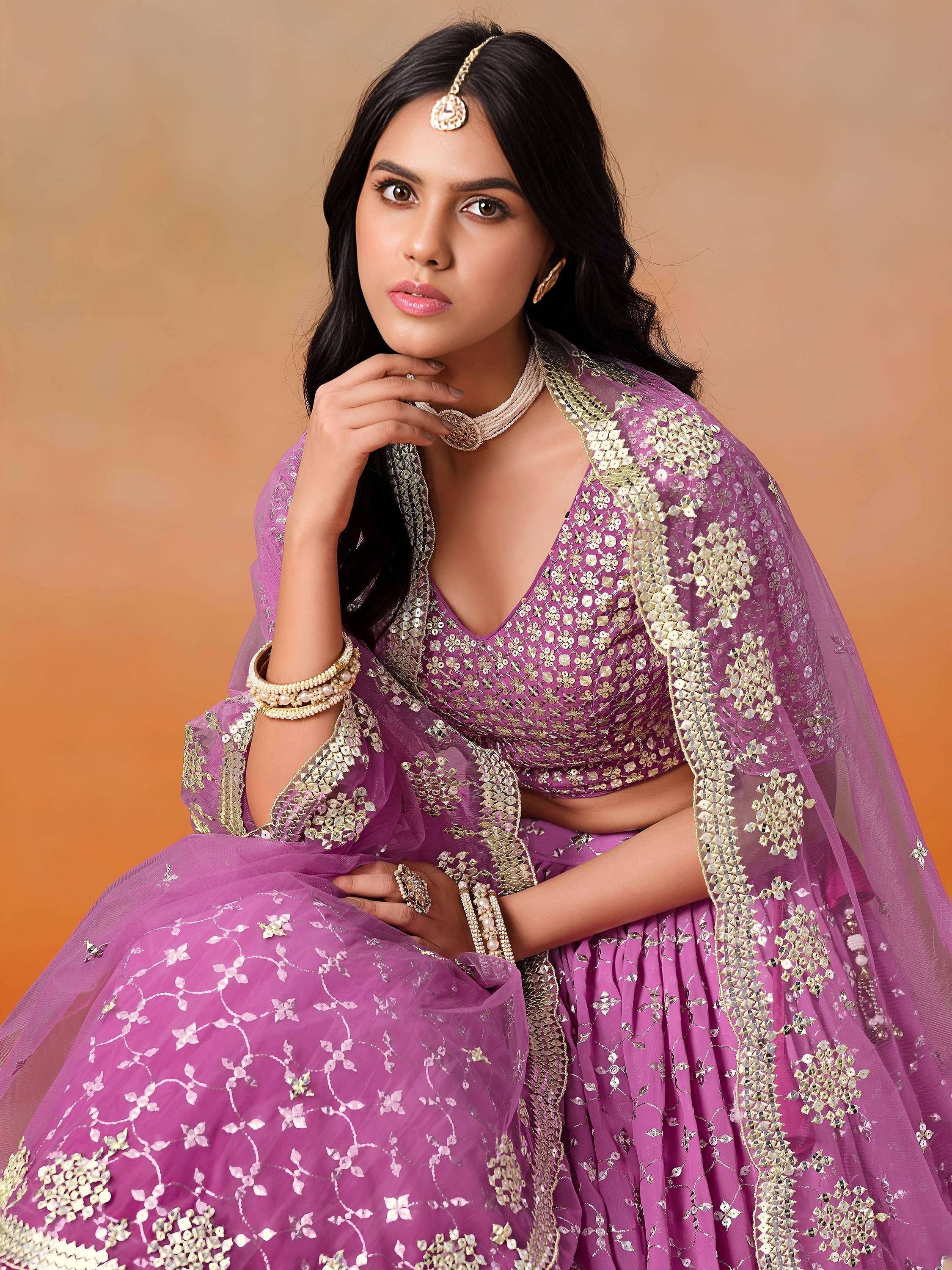 Embroidered georgette lehenga choli with sequins work for wedding and festive occasions