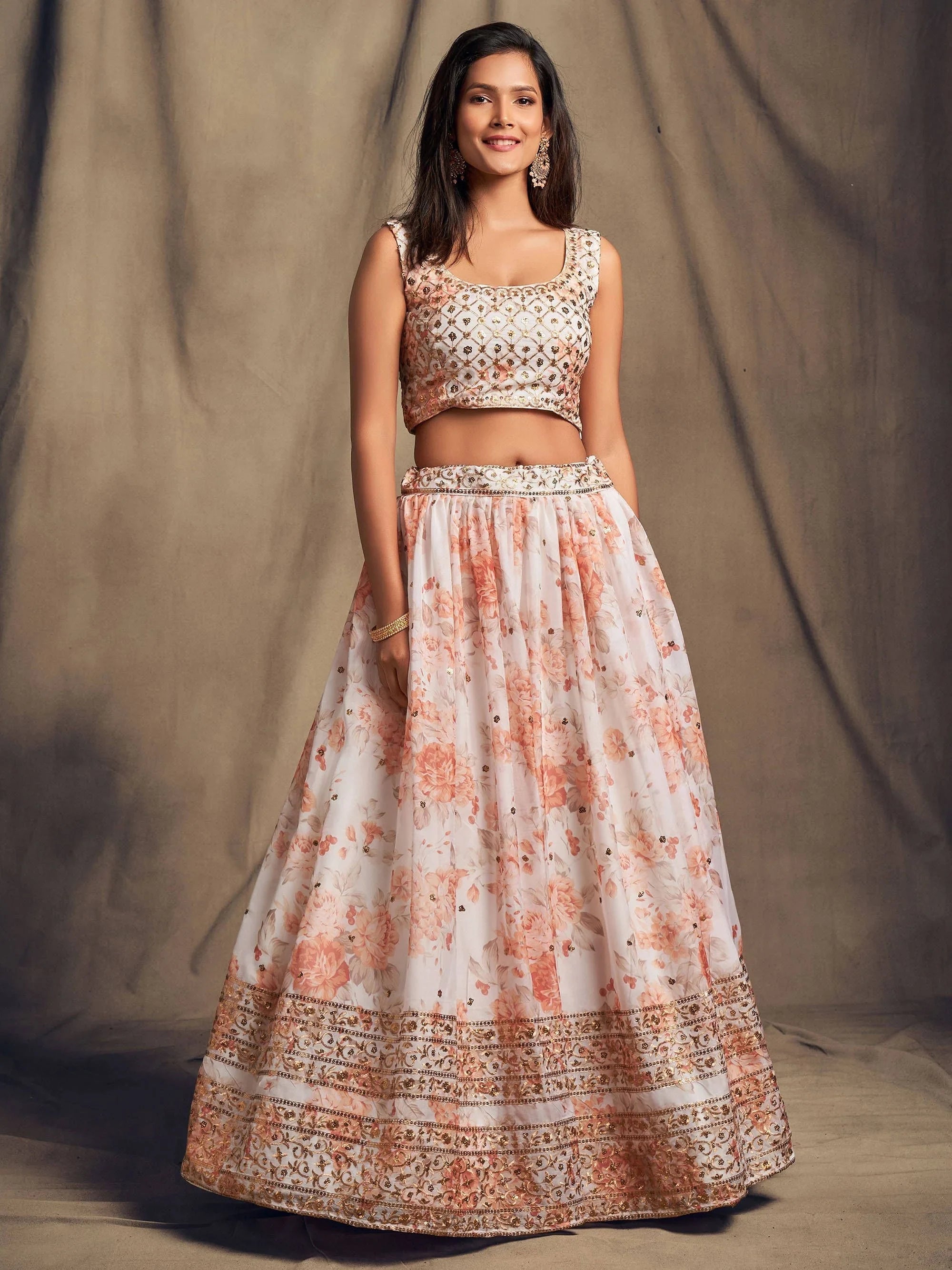 Organza lehenga choli with sequin embellishment and floral embroidery for wedding and festive wear