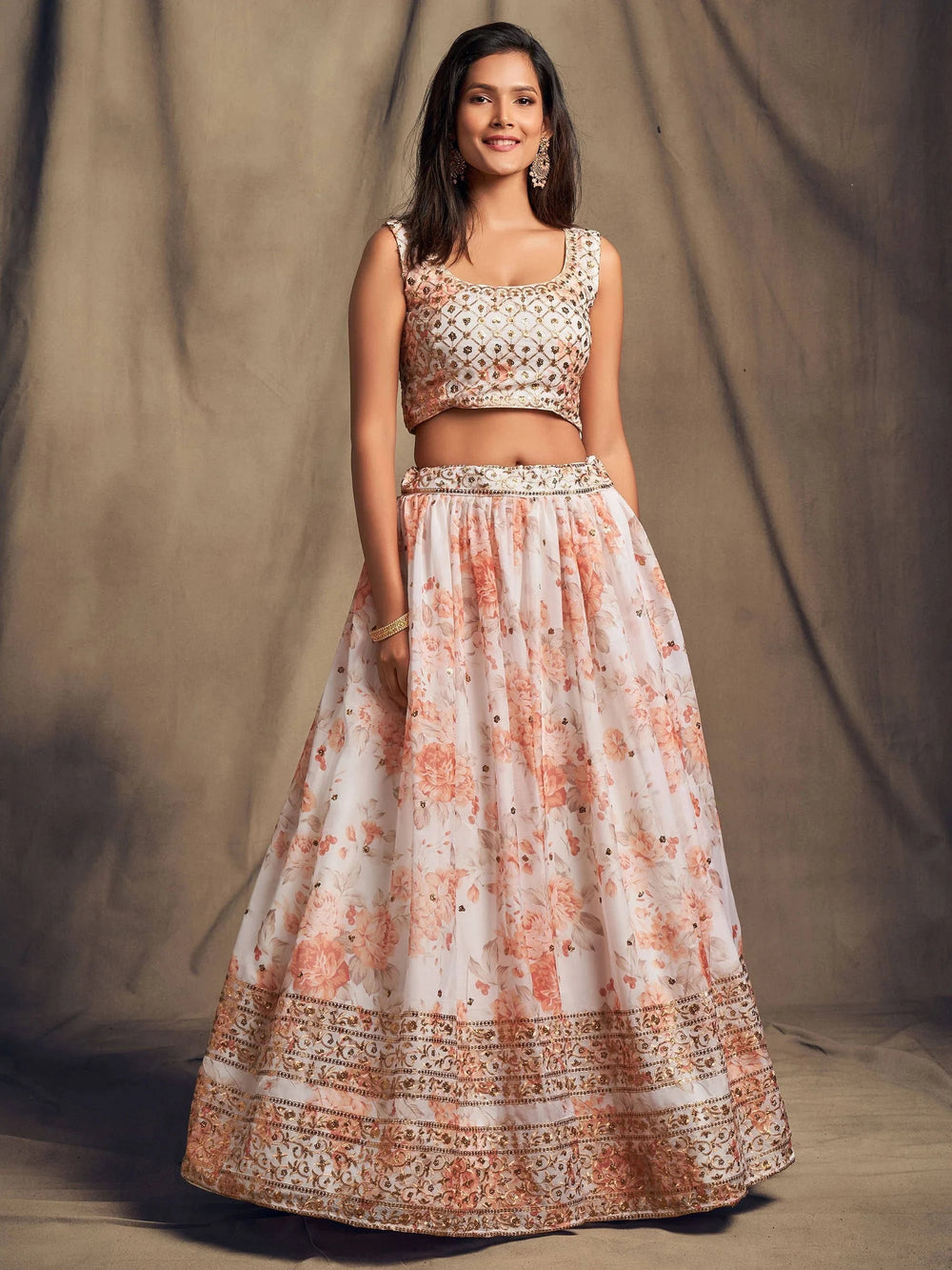 Organza lehenga choli with sequin embellishment and floral embroidery for wedding and festive wear