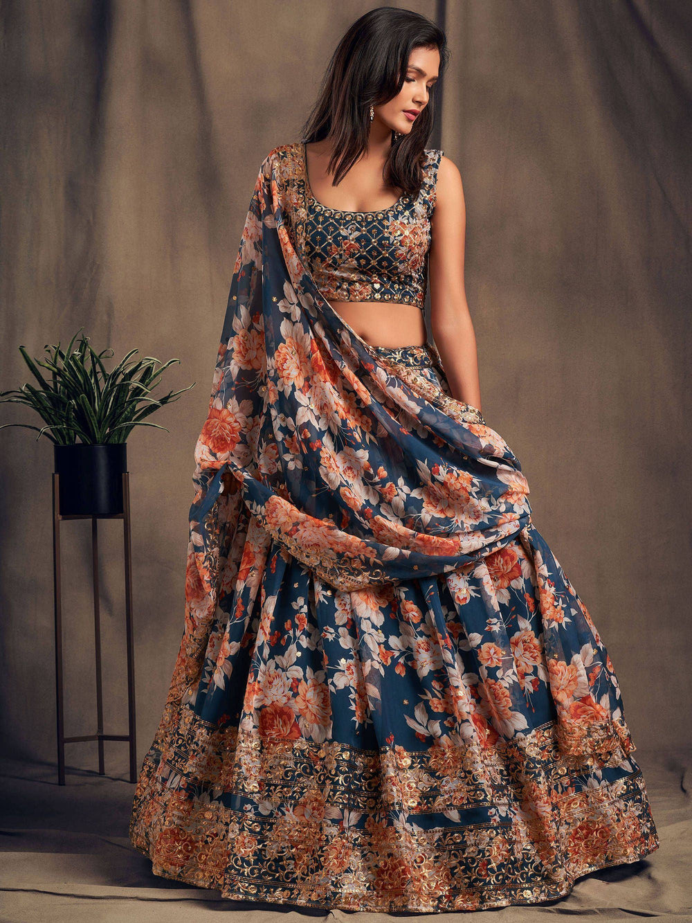 Organza lehenga choli with sequin embellishment and floral embroidery for wedding occasions
