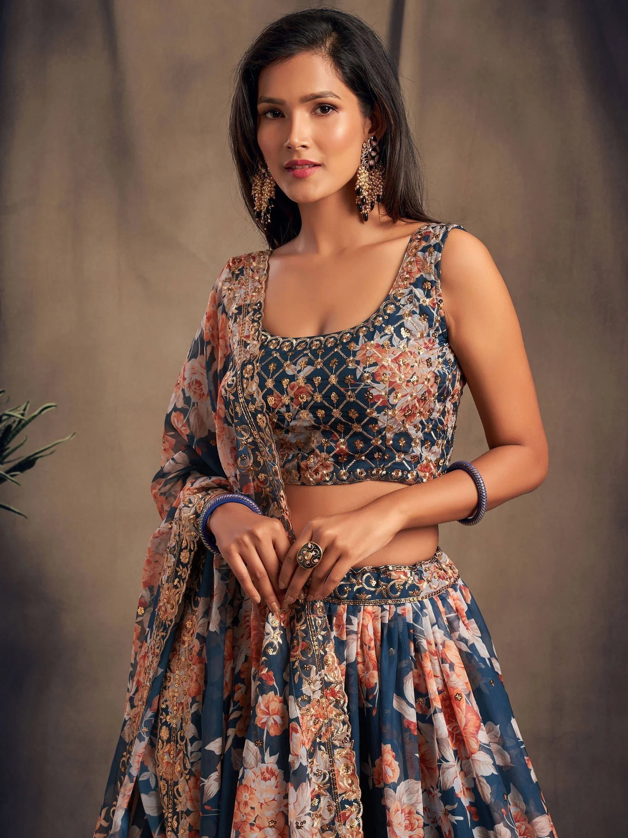 Organza lehenga choli with sequin embellishment and floral embroidery for wedding occasions
