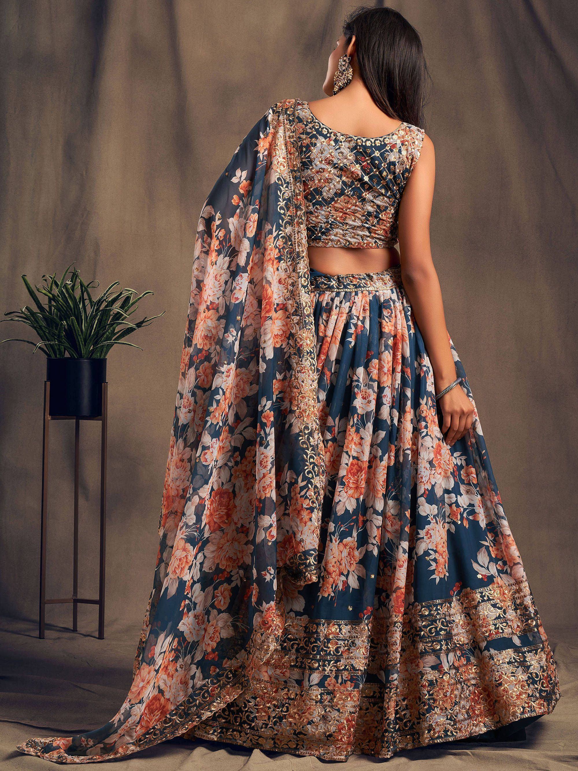 Organza lehenga choli with sequin embellishment and floral embroidery for wedding occasions