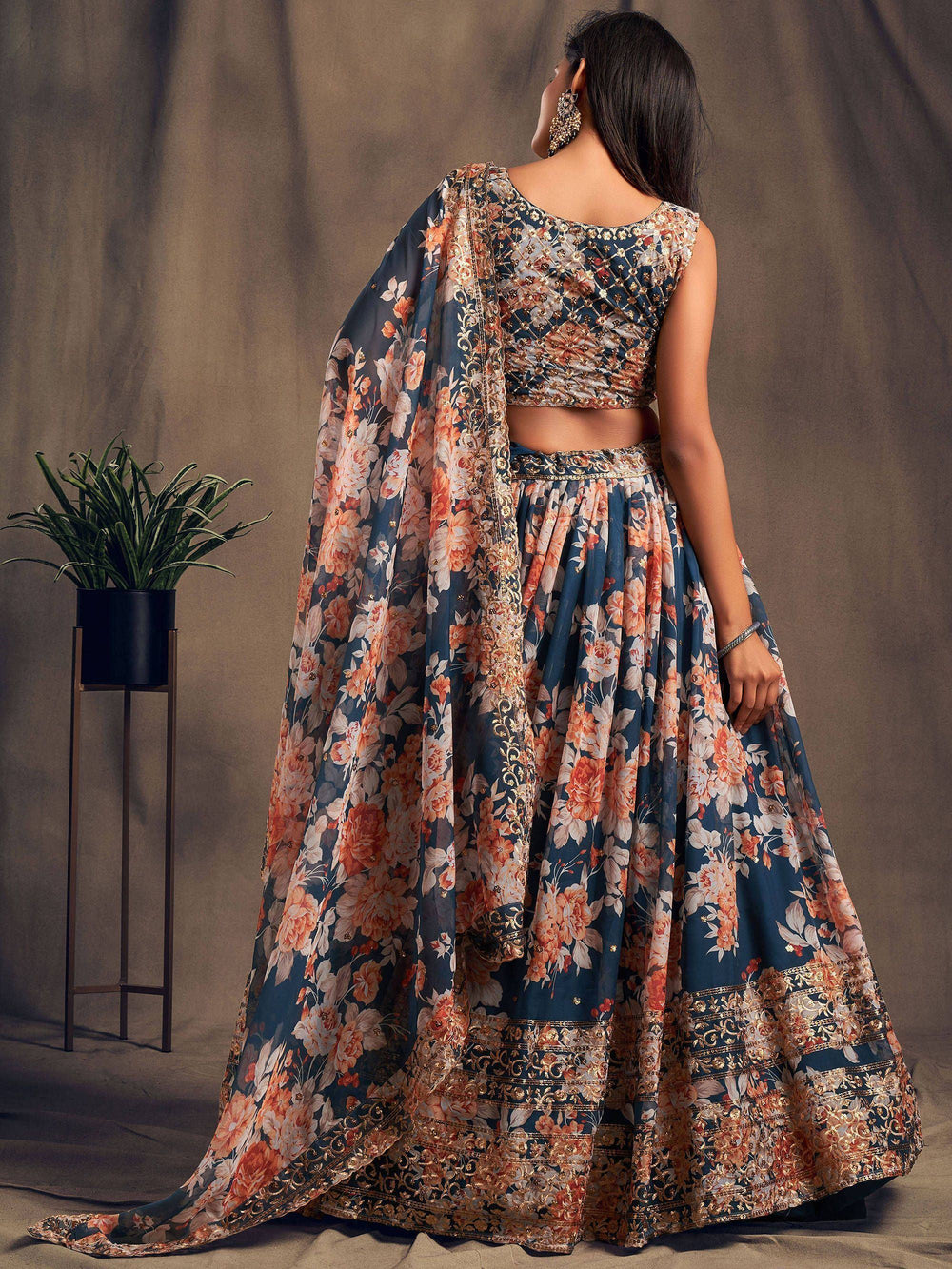Organza lehenga choli with sequin embellishment and floral embroidery for wedding occasions