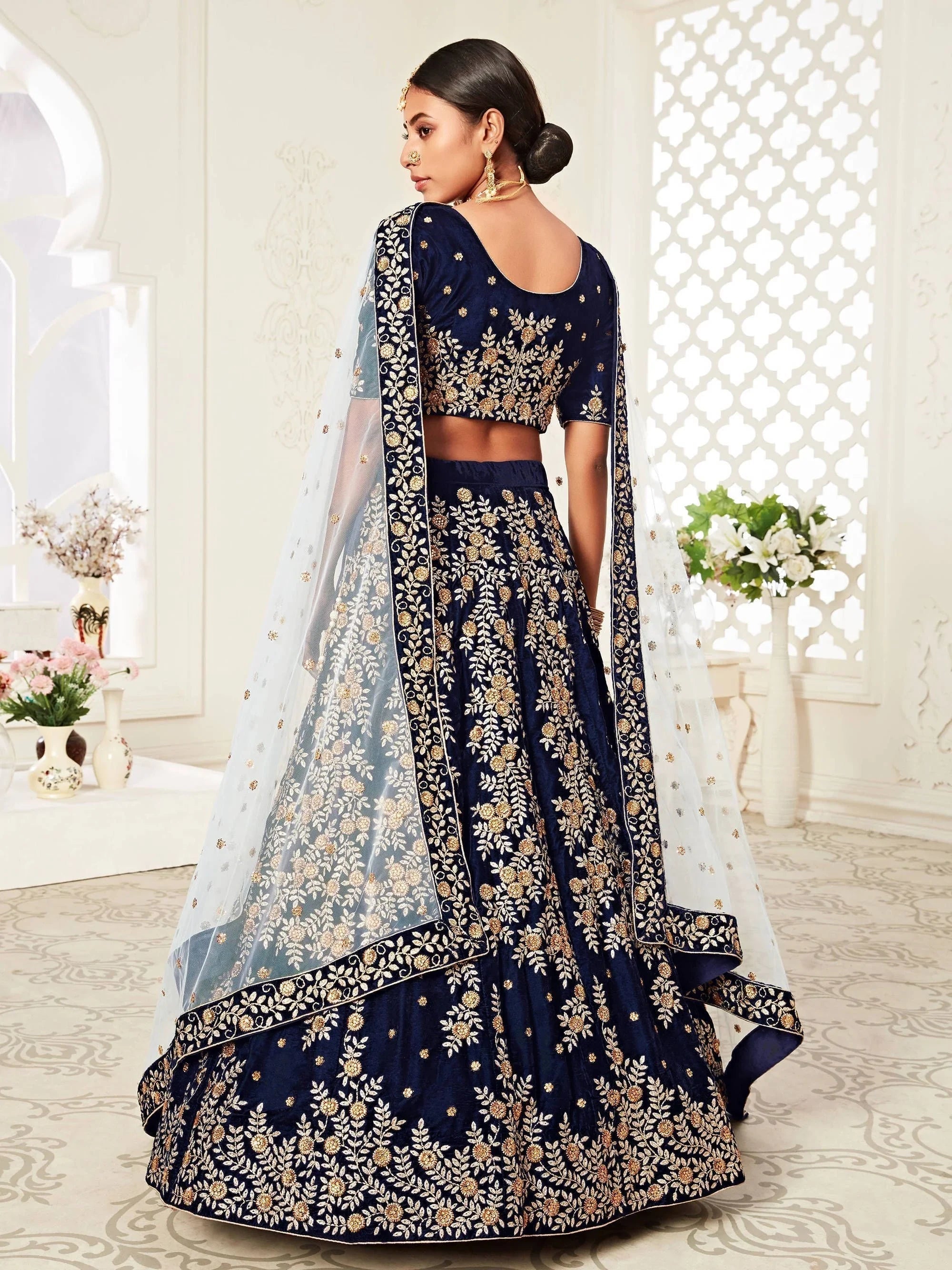 Velvet lehenga choli with embroidery and sequins work for wedding and reception