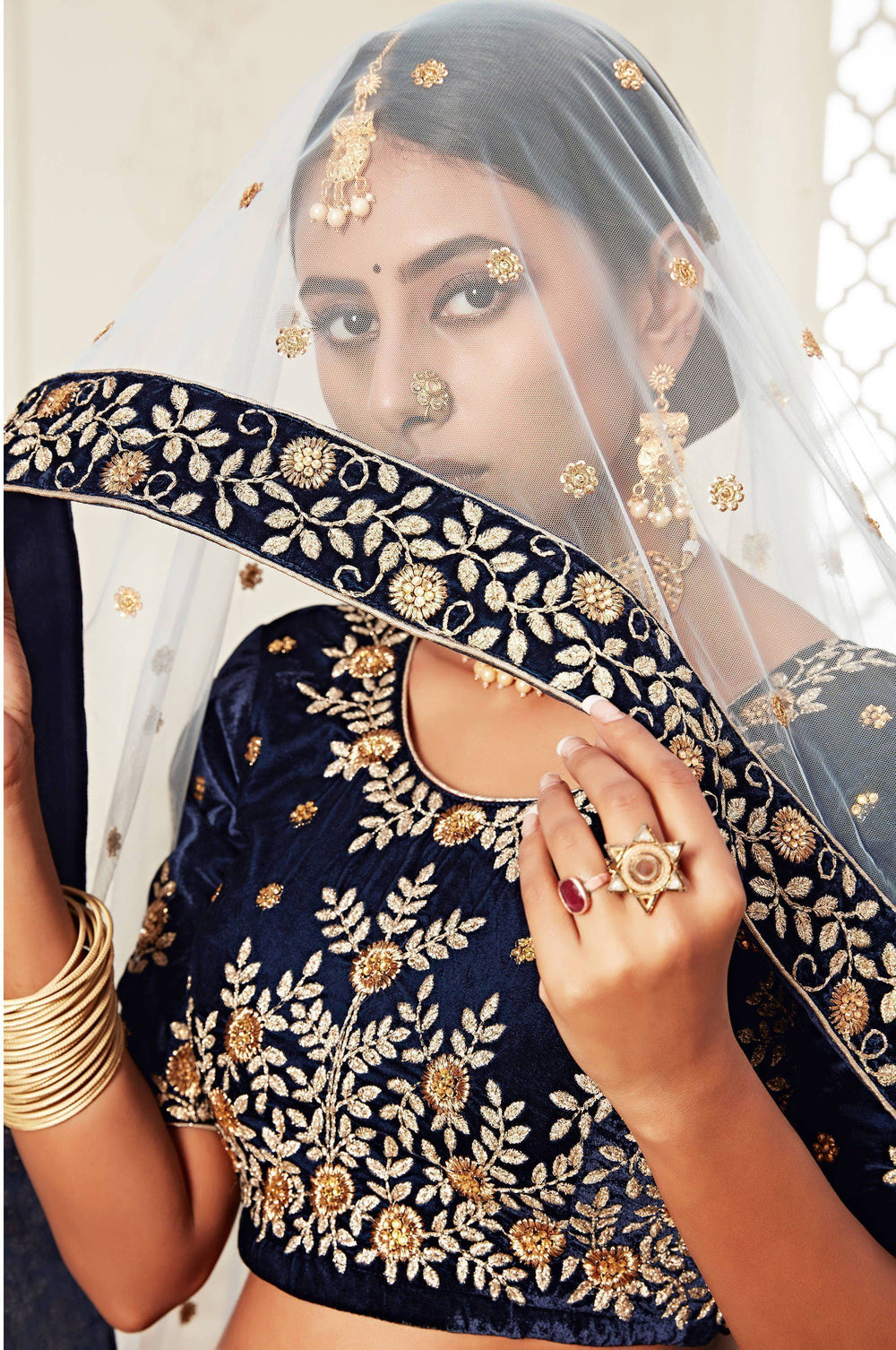 Velvet lehenga choli with embroidery and sequins work for wedding and reception