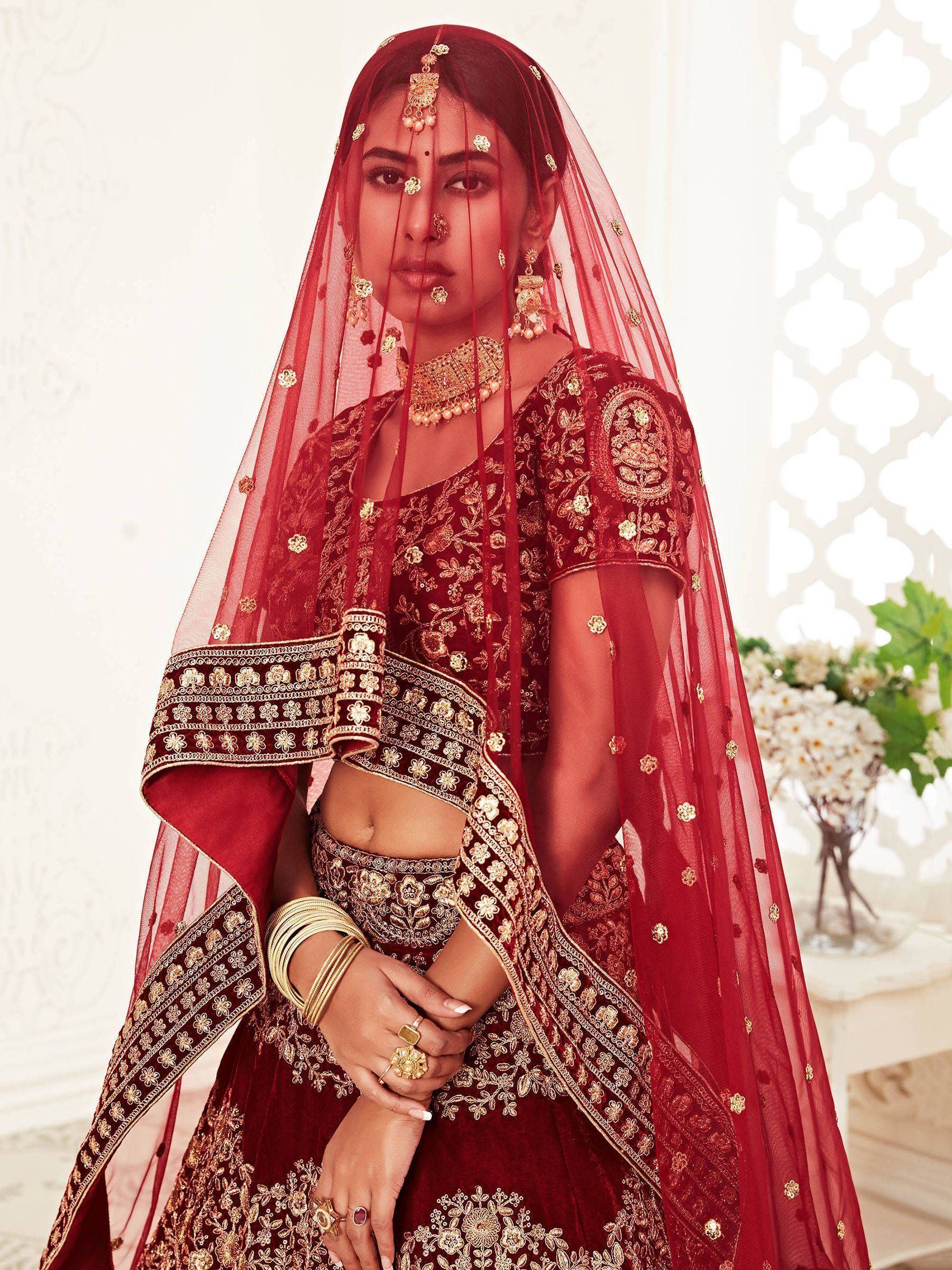 Heavy embroidered velvet bridal lehenga choli with sequins stone work for wedding
