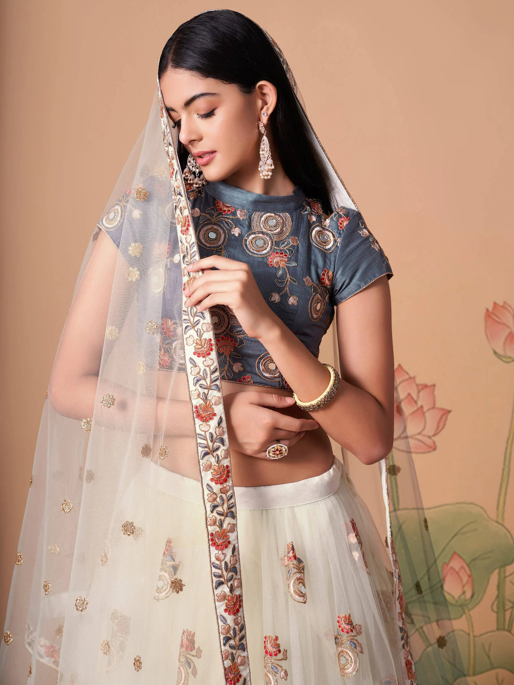 Ivory Embroidered Net Party Lehenga Choli Occasion Wear