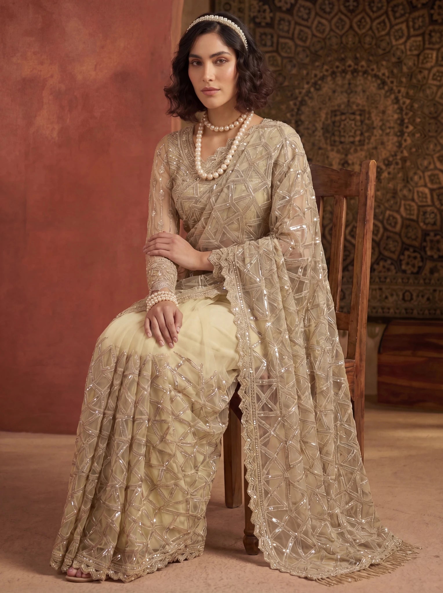Elegant Champagne Gold Designer Saree With Intricate Geometric Embroidery Handwork - Zimonza