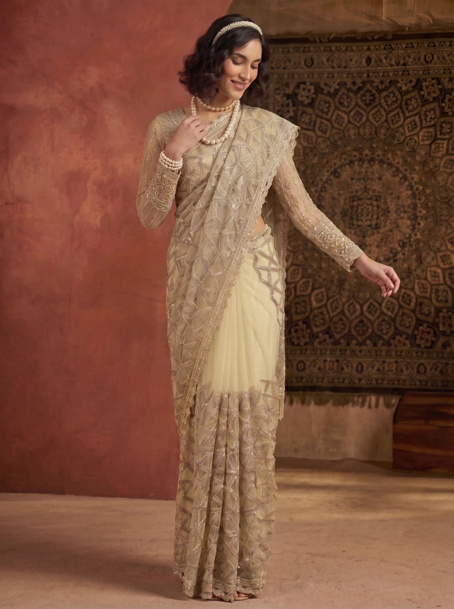 Elegant Champagne Gold Designer Saree With Intricate Geometric Embroidery Handwork - Zimonza