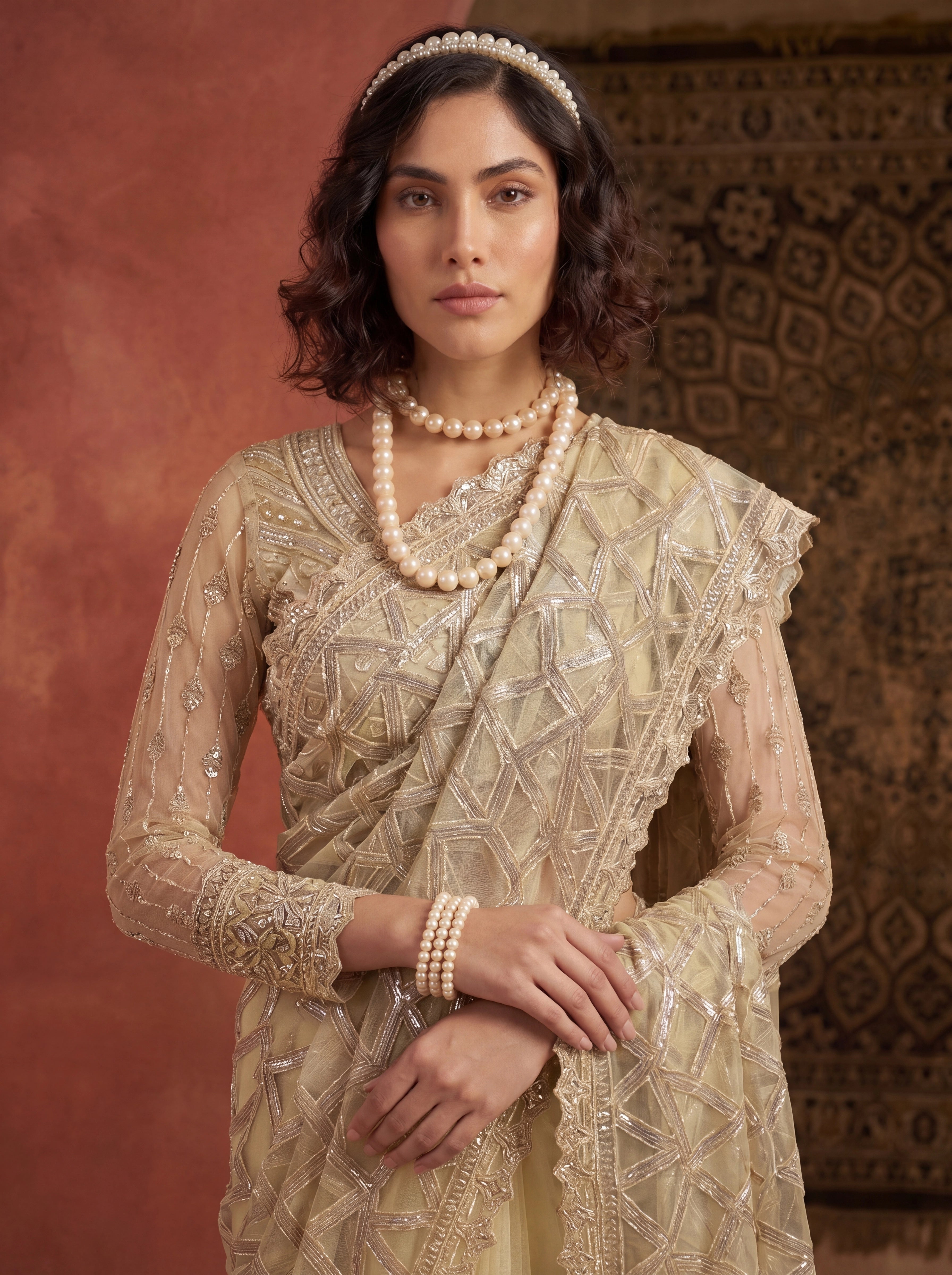 Elegant Champagne Gold Designer Saree With Intricate Geometric Embroidery Handwork