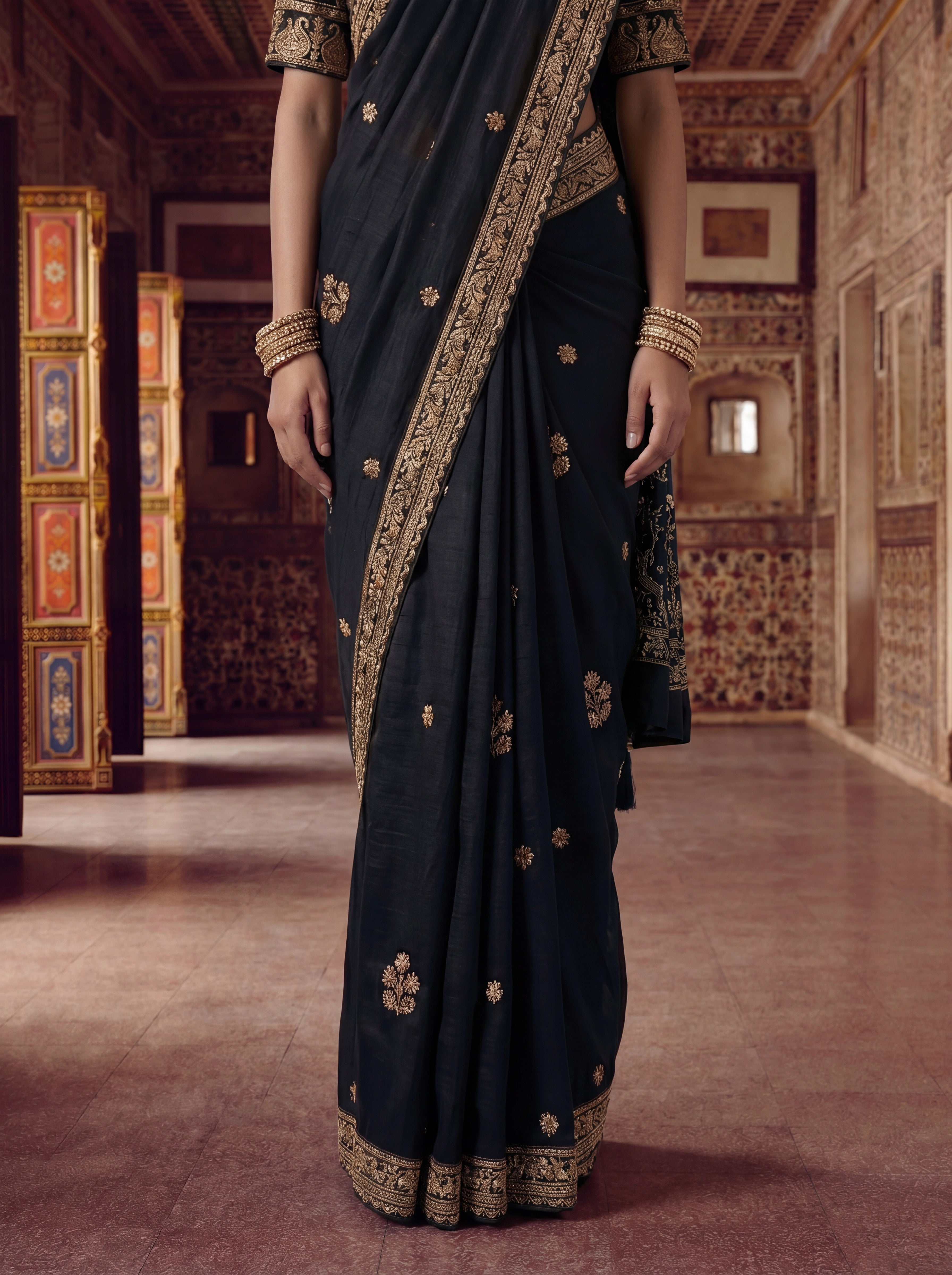 Luxury Black Designer Saree with Intricate Gold Zari Work