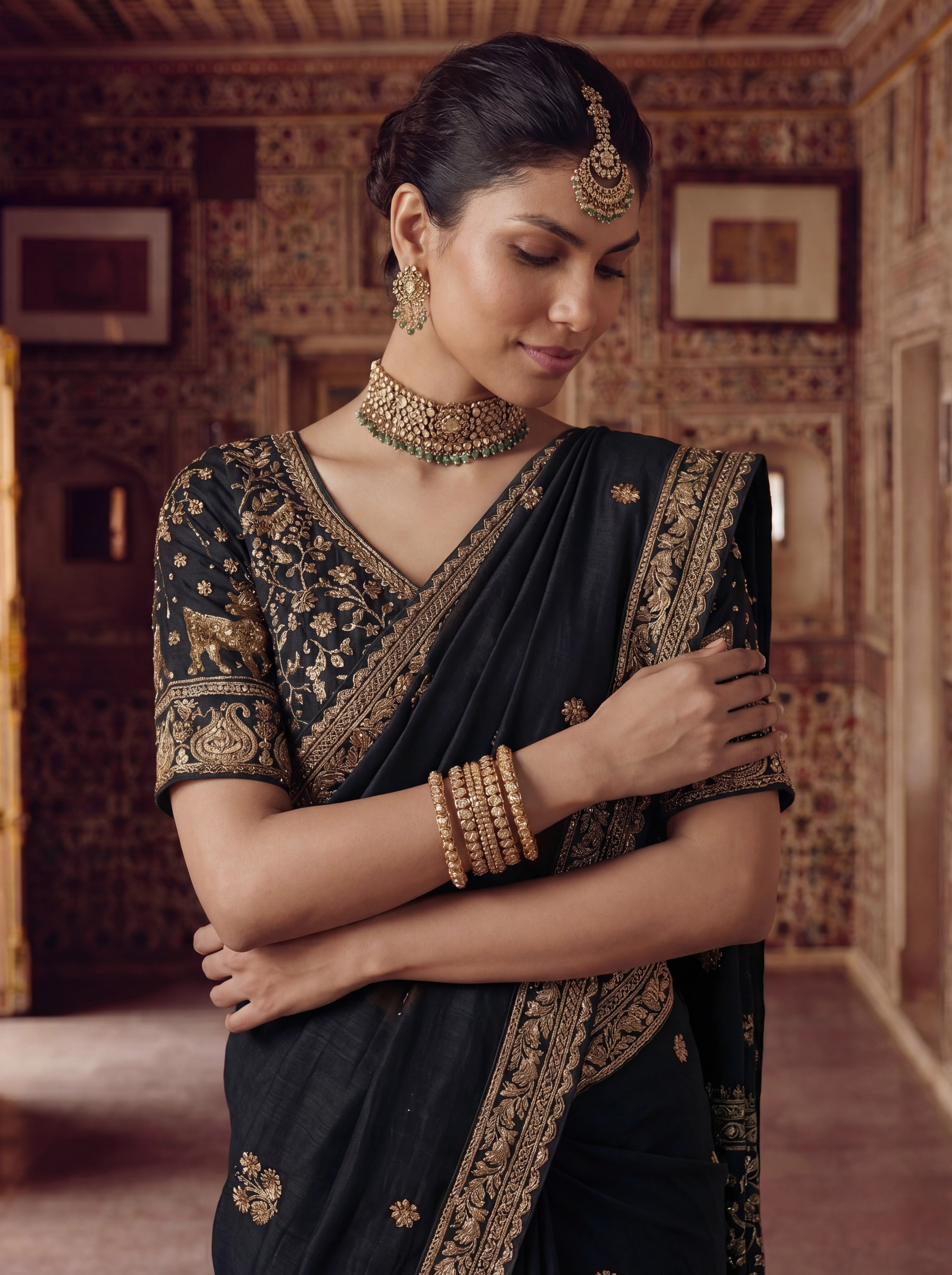 Luxury Black Designer Saree with Intricate Gold Zari Work