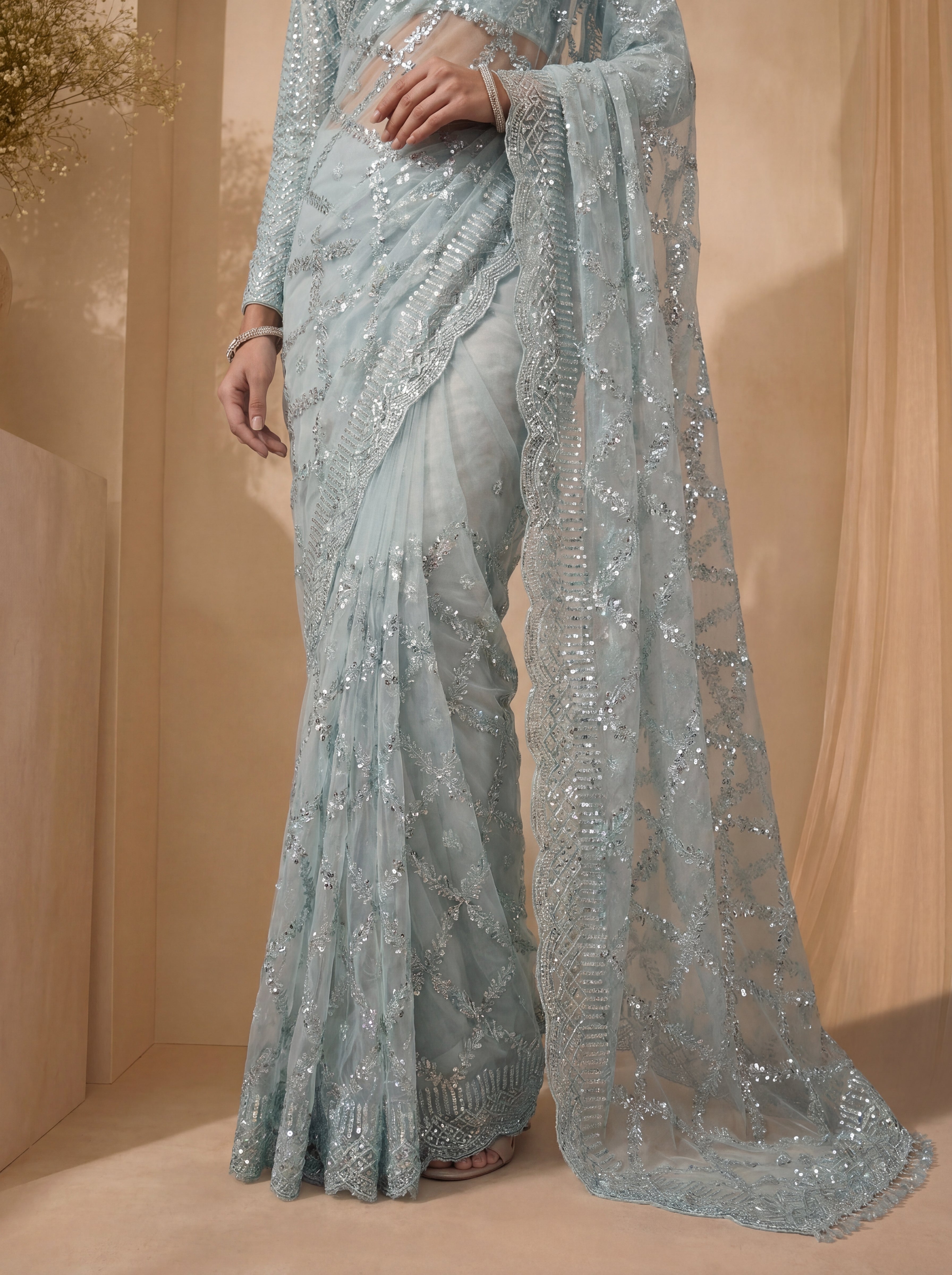 Royal Firozi Net Saree with Shimmering Sequin Embroidery