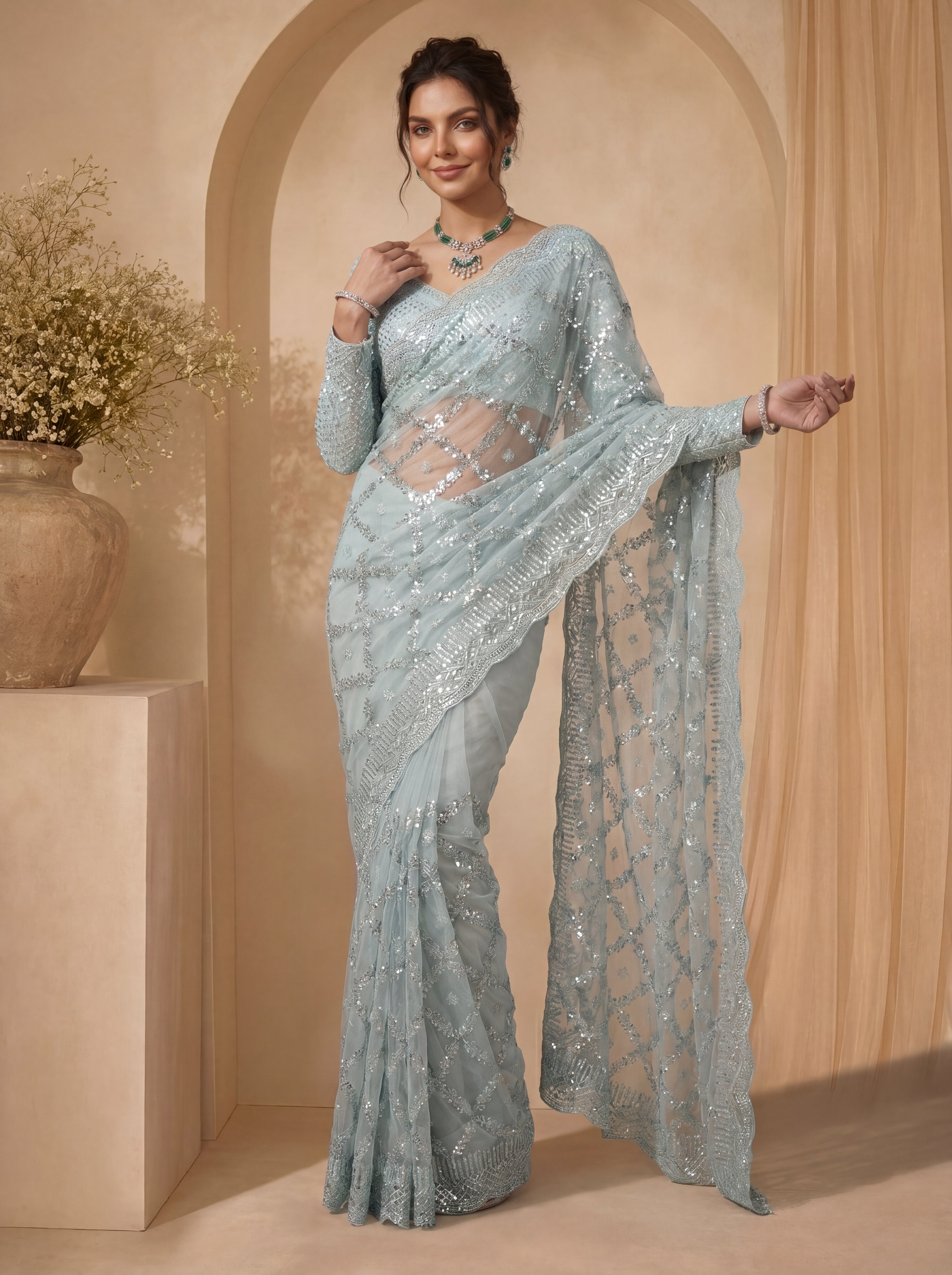Royal Firozi Net Saree with Shimmering Sequin Embroidery