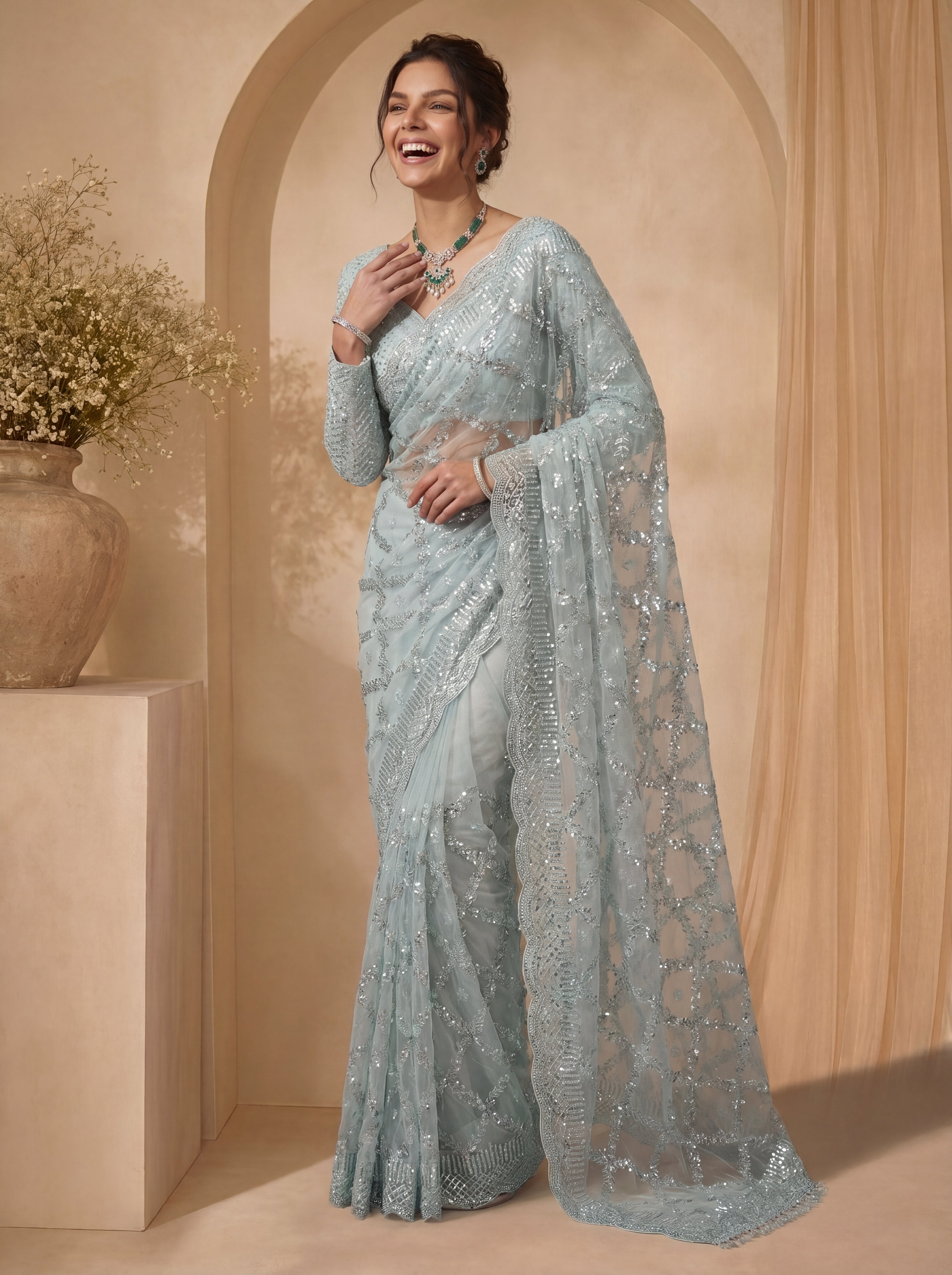 Royal Firozi Net Saree with Shimmering Sequin Embroidery