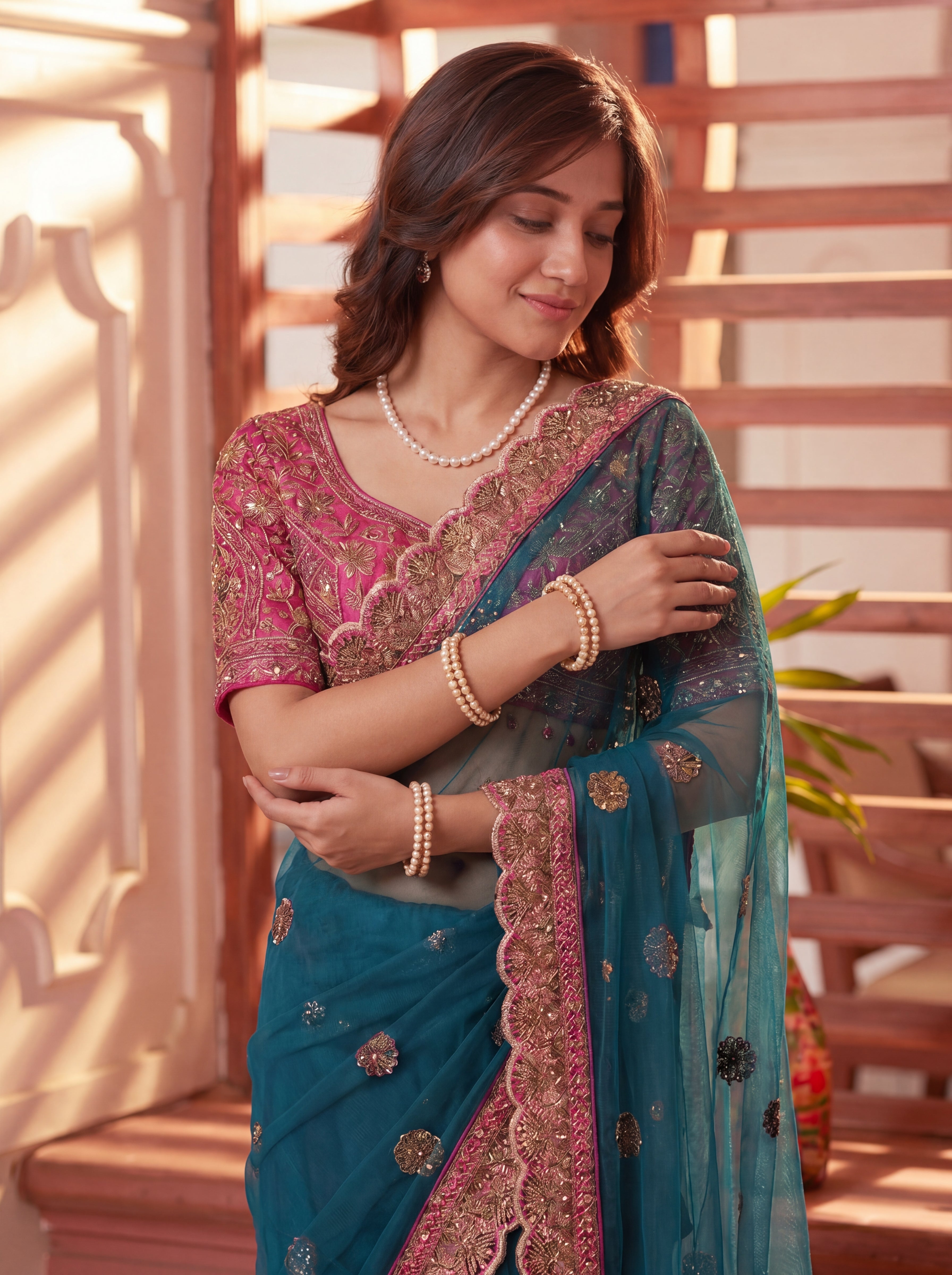 Royal Firozi Net Saree with Intricate Sequins, Mirror Work, Embroidery, Cording & Handcrafted Border Detailing