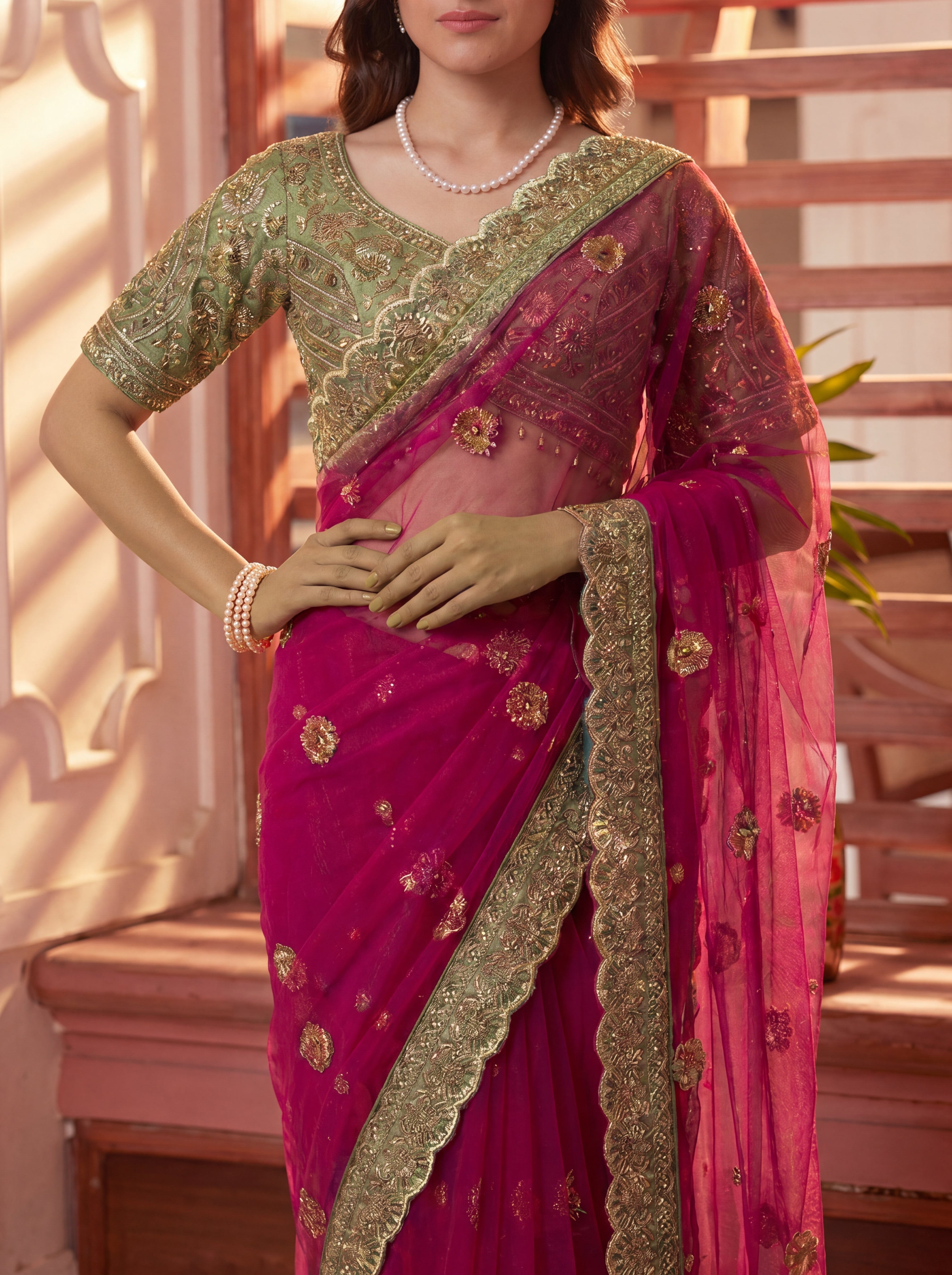Royal Rani Net Saree with Intricate Sequins, Mirror Work, Embroidery, Cording & Handcrafted Border Detailing