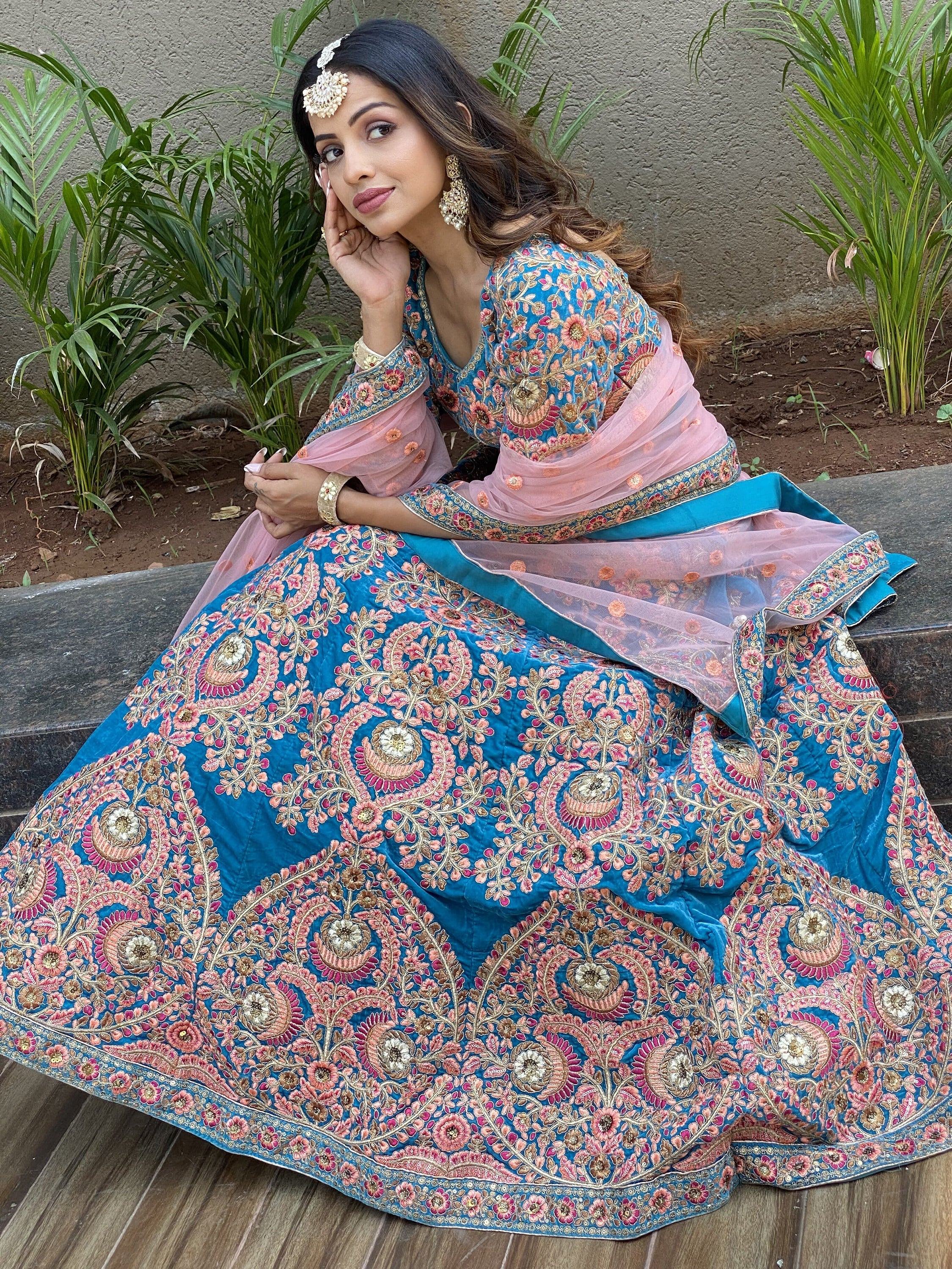 Embroidered velvet lehenga choli with zari sequins work for wedding and bridal occasions