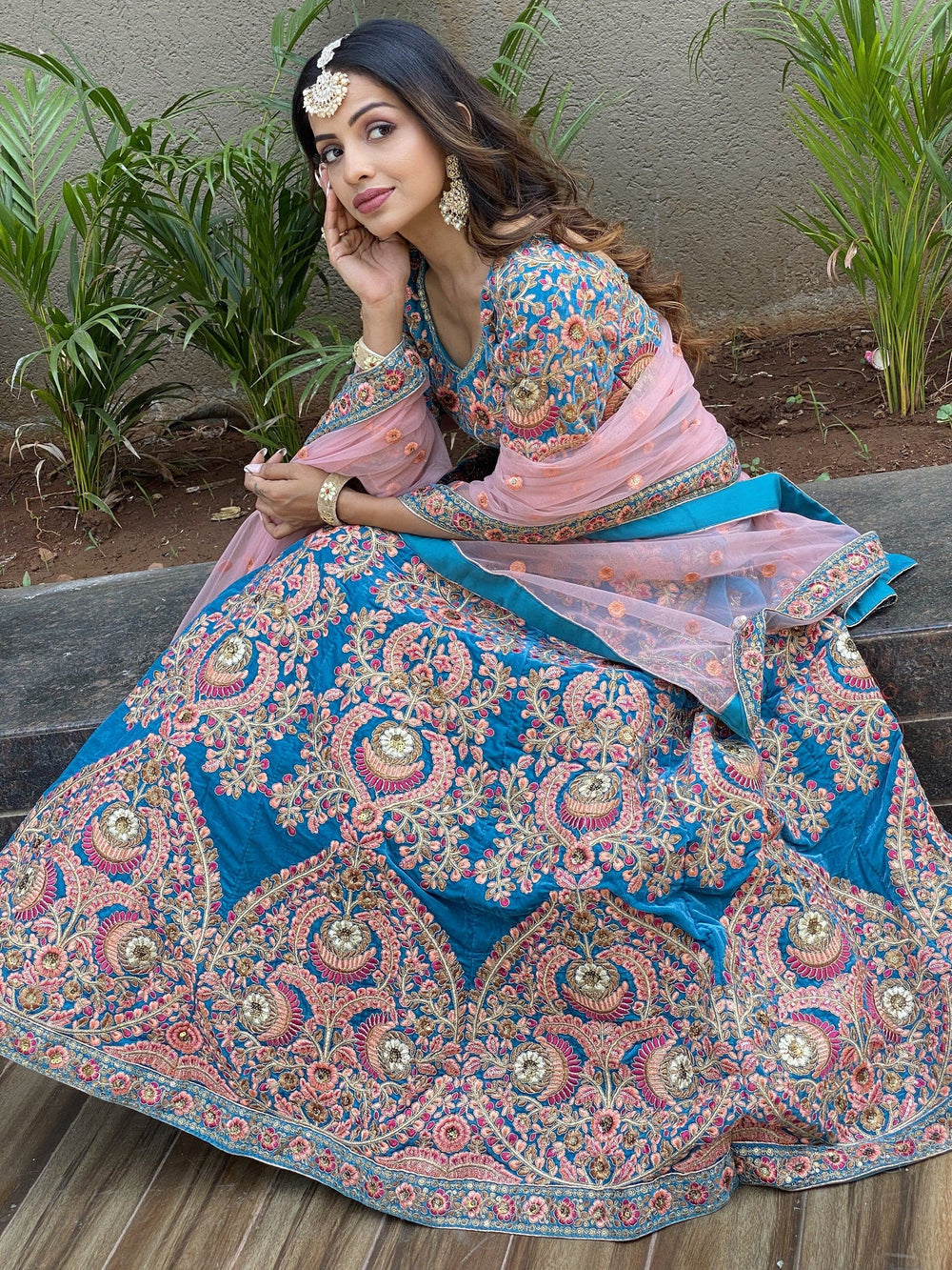 Embroidered velvet lehenga choli with zari sequins work for wedding and bridal occasions