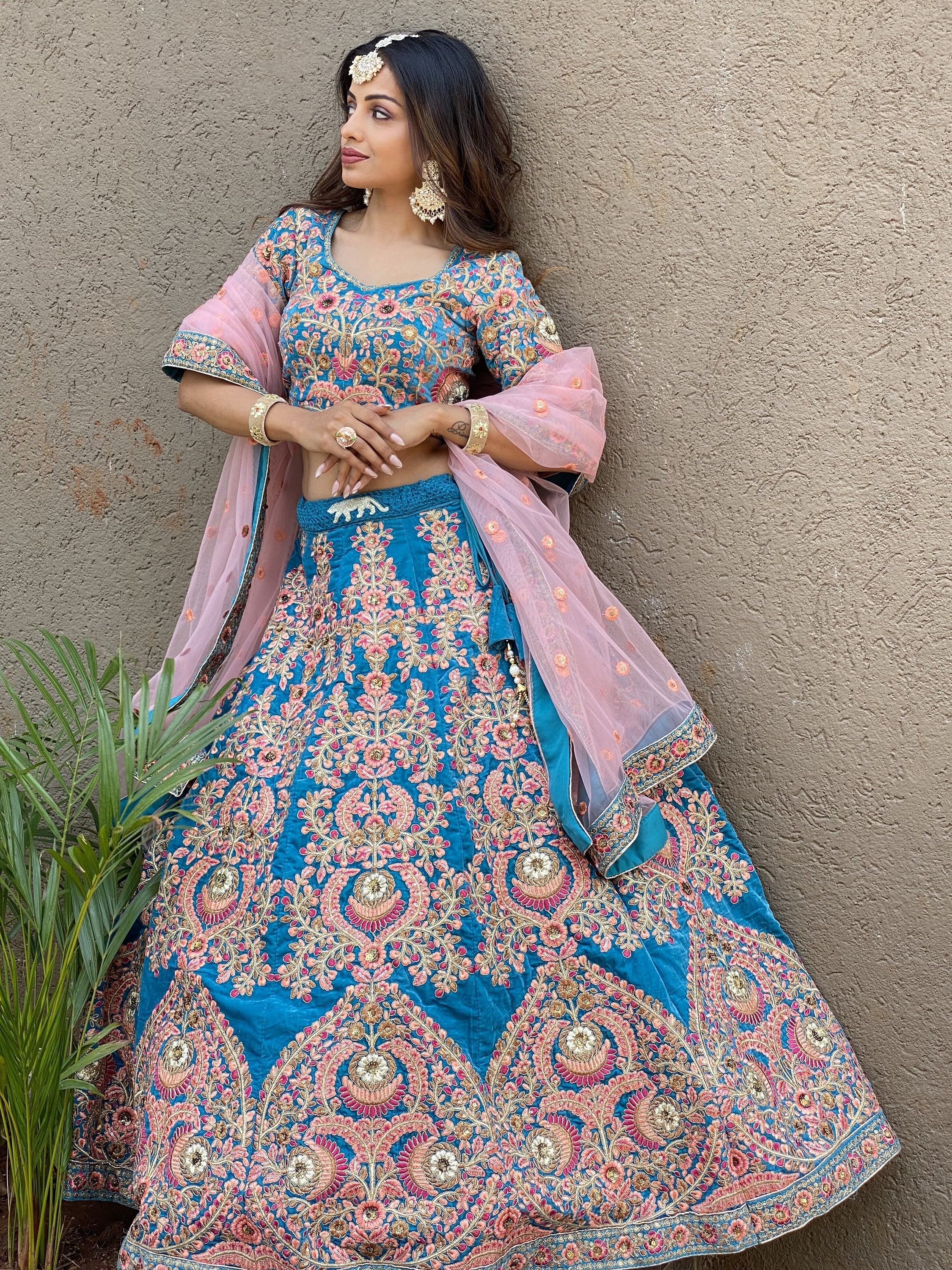 Embroidered velvet lehenga choli with zari sequins work for wedding and bridal occasions