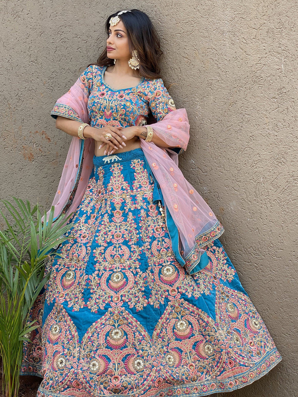 Embroidered velvet lehenga choli with zari sequins work for wedding and bridal occasions
