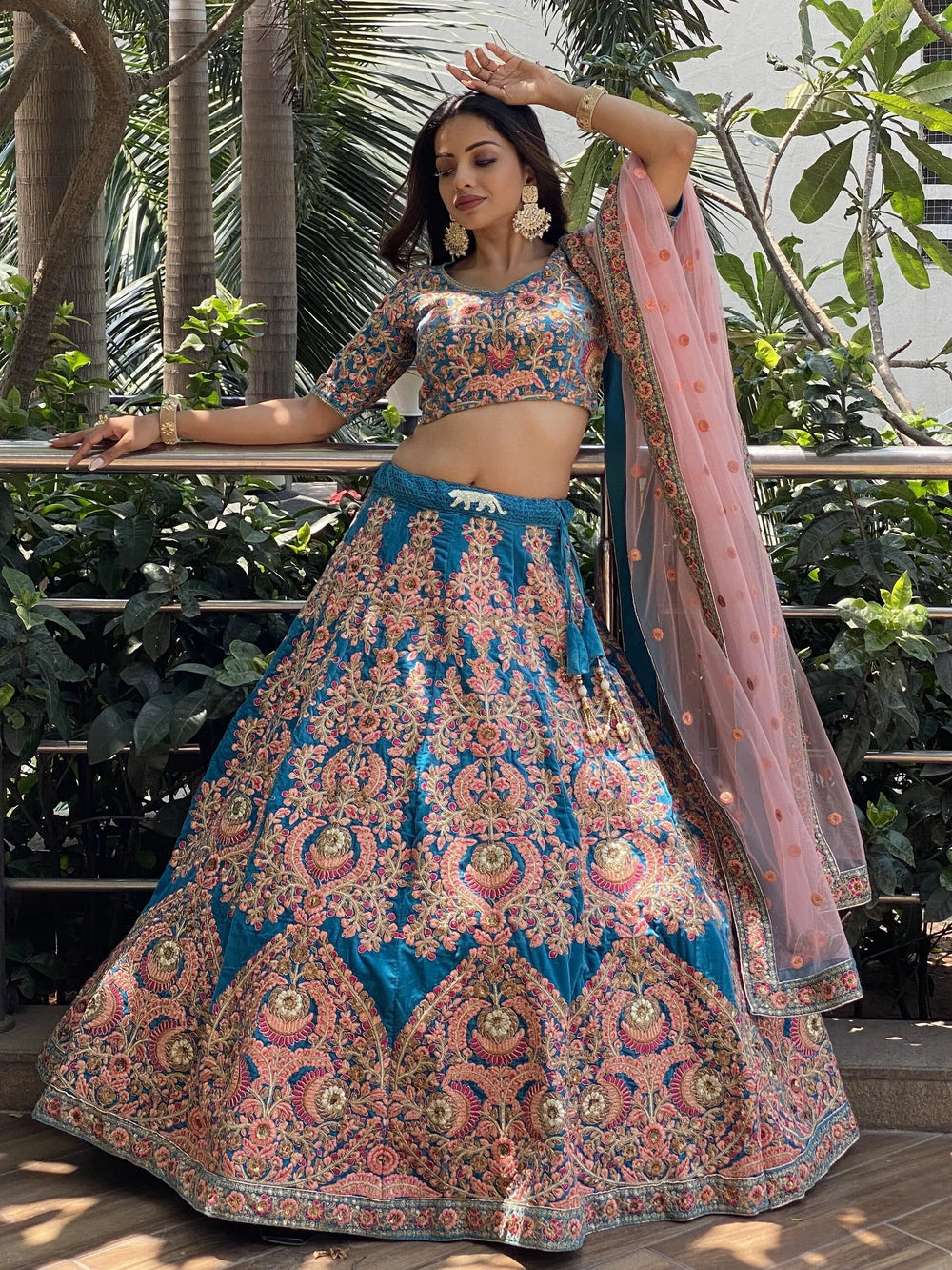 Embroidered velvet lehenga choli with zari sequins work for wedding and bridal occasions