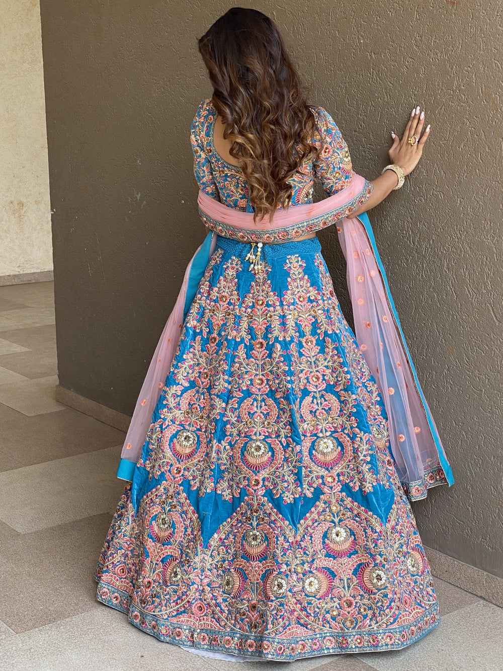 Embroidered velvet lehenga choli with zari sequins work for wedding and bridal occasions