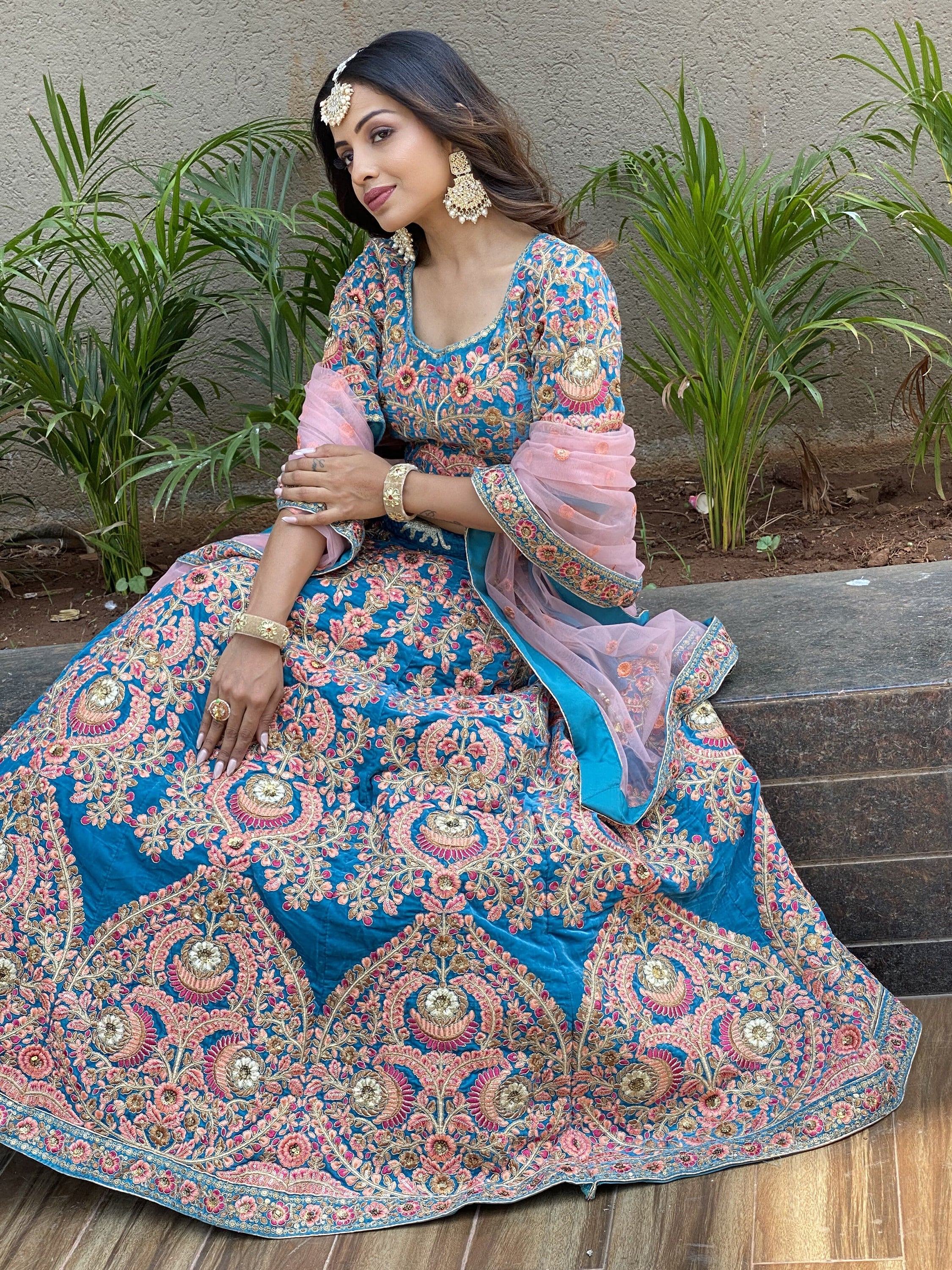 Embroidered velvet lehenga choli with zari sequins work for wedding and bridal occasions