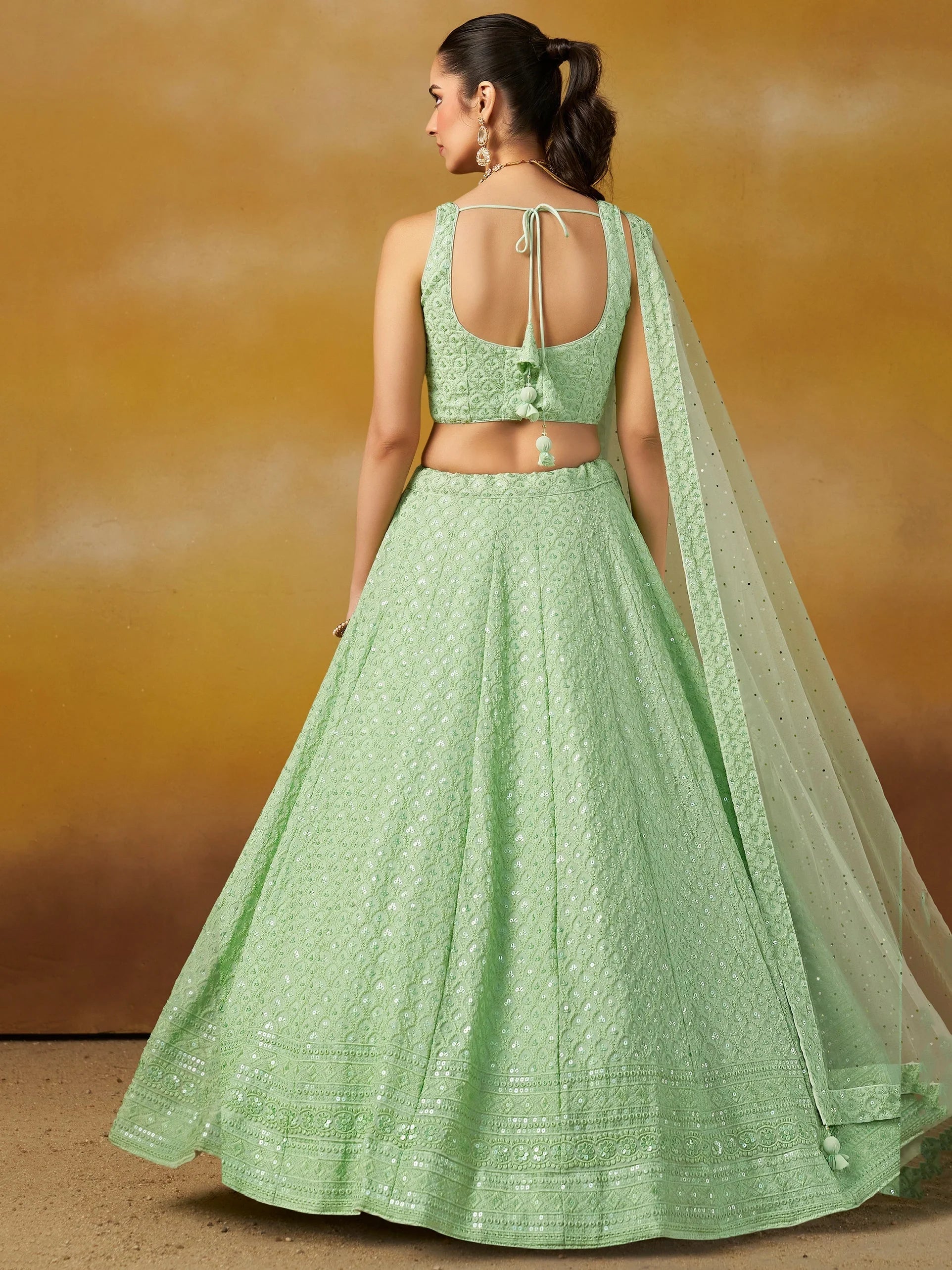 Sequins georgette lehenga choli with thread embroidery for wedding and sangeet occasions