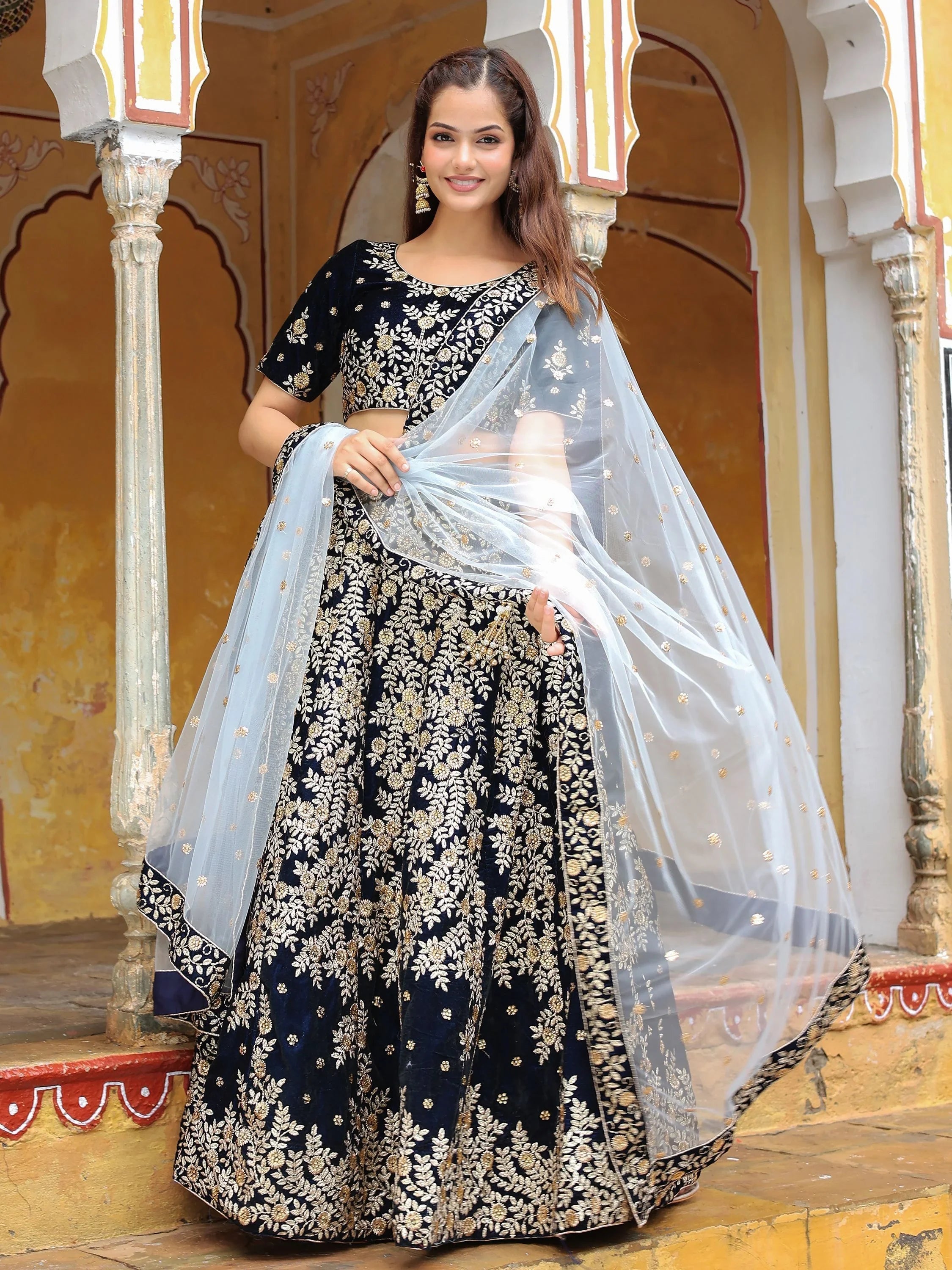 Velvet lehenga choli with embroidery and sequins work for wedding and reception