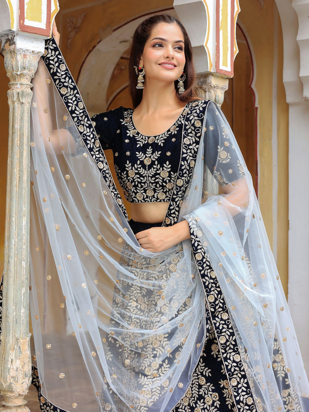 Velvet lehenga choli with embroidery and sequins work for wedding and reception