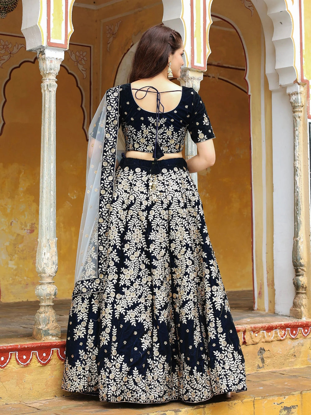 Velvet lehenga choli with embroidery and sequins work for wedding and reception