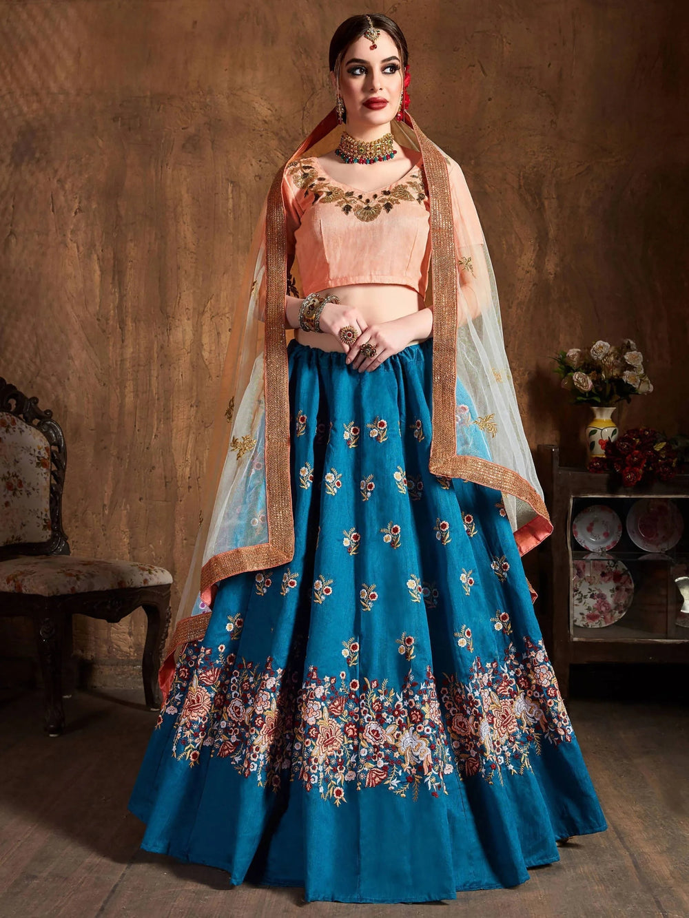 Teal Blue Thread Work Raw Silk Bridal Lehenga Choli with Peach Choli and Off-White Dupatta