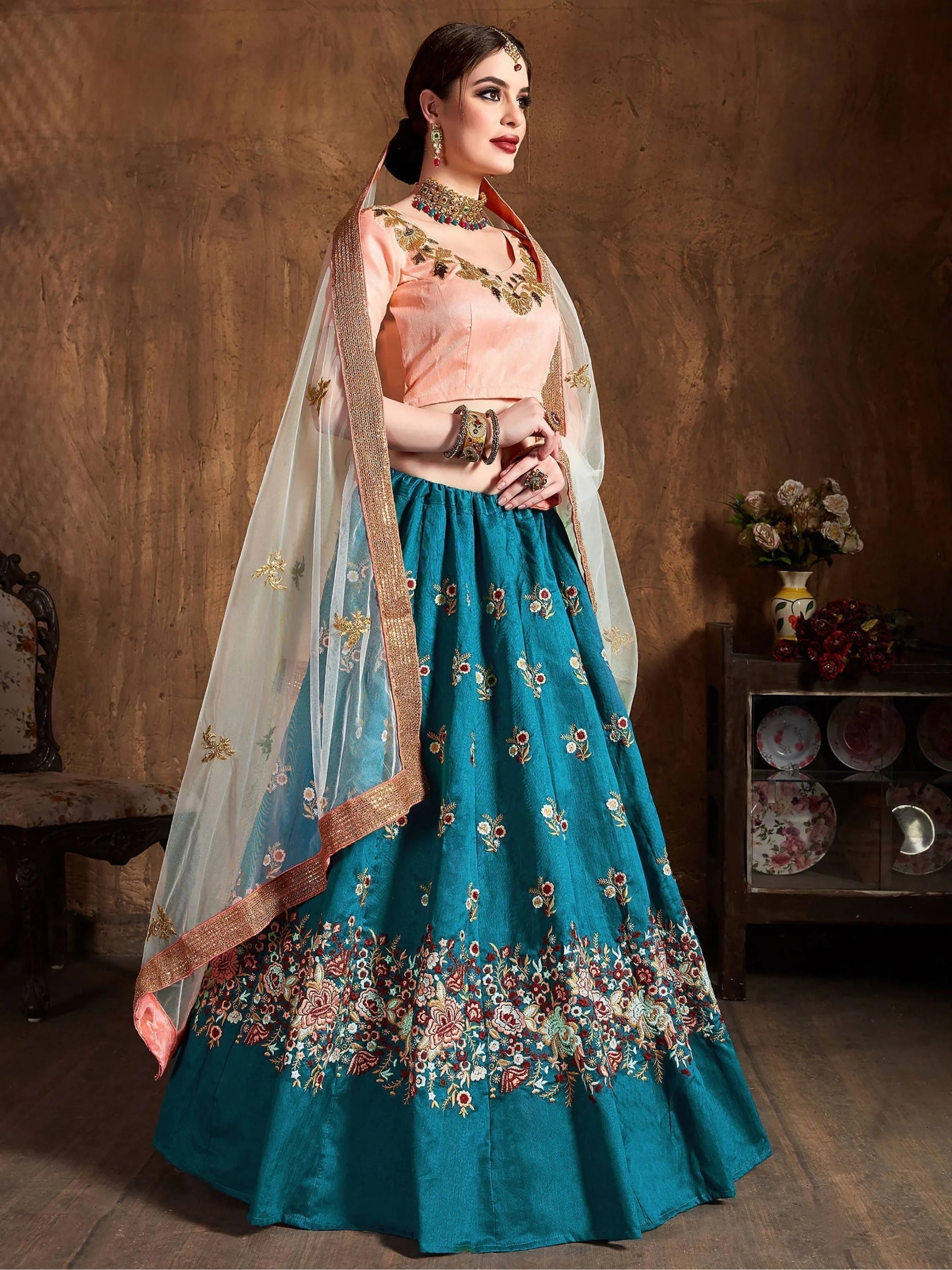 Teal Blue Thread Work Raw Silk Bridal Lehenga Choli with Peach Choli and Off-White Dupatta